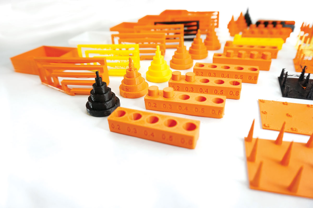 The 2015 3DP Test Geometries, created by Andreas Bastain, are available fromMake:’s YouMagine and Thingiverse accounts. Print them yourself and report your settings and scores!